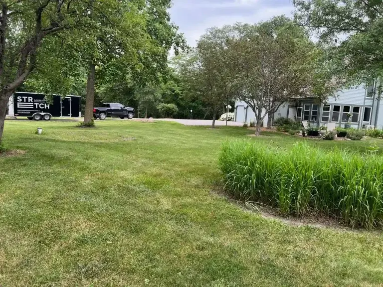 Stretch Property Maintenance performed weekly mowing at house in Granger, IA near Jester Park.