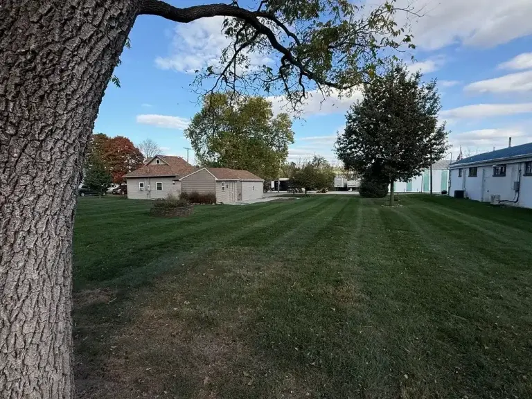Stretch Property Maintenance performed weekly mowing at residential home in Granger, IA