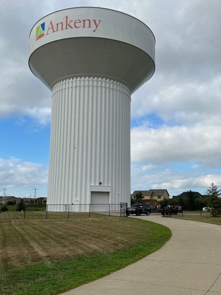 Stretch Property Maintenance truck and equipment at the water tower on SW Irvinedale Drive in Ankeny, IA