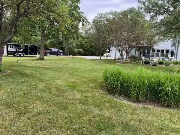 Stretch Property Maintenance performed weekly mowing at house in Granger, IA near Jester Park.