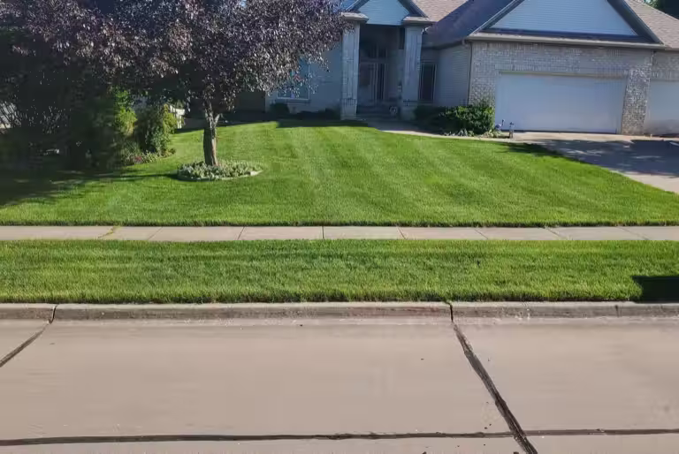 Stretch Property Maintenance performed weekly mowing in Johnston, IA